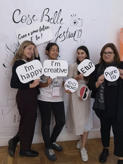 Deborah, Creative Director of the event, and the girls of her team,  Darina, Arianna and Stefania, posing in a fun way at the Photo-Boot station during the Cose Belle Festival 2019.