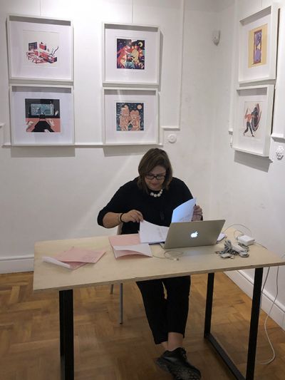 Deborah De Rose, Creative Director of the event, works on her MacBook during the preparation phase of the Cose Belle Festival 2019.
